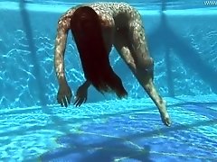 Sexy underwater solo show of long haired amateur babe is worth watching