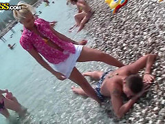 Horny blonde is walking on the beach in Turkey in bikini