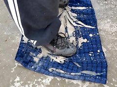 wet soil on blue tartan skirt