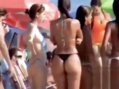 Latina babe with big booty wears a flimsy bikini bottom