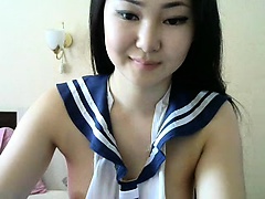 Cute Asian girl is teasing and showing her ass on live webc